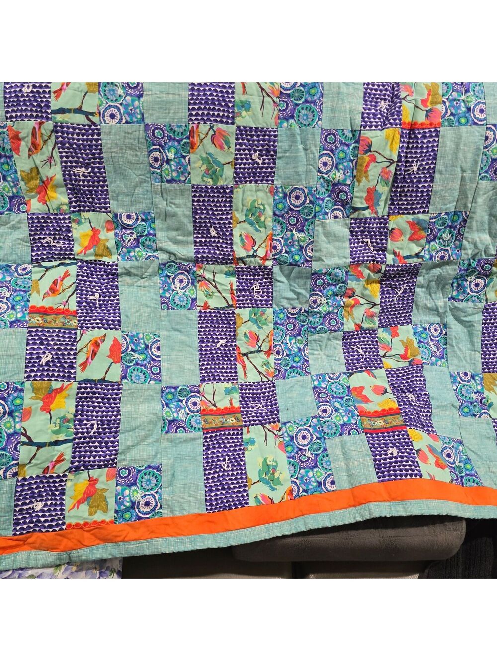 q111 Handcrafted Patchwork Quilt with Floral and Geometric Patterns
